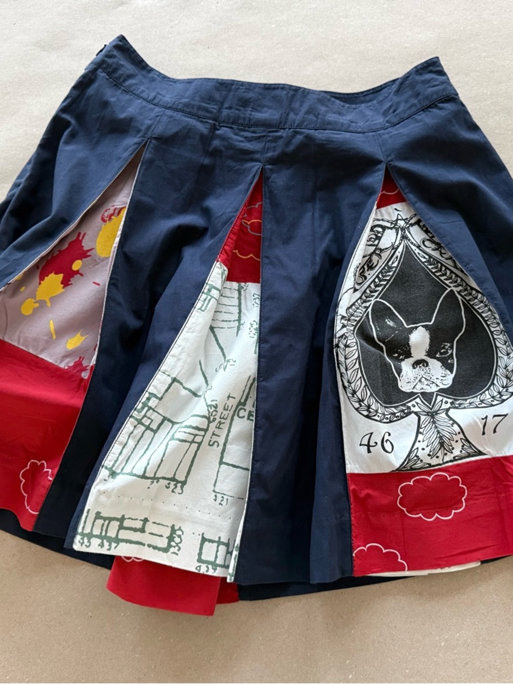 Anthropologie — NWOT Lithe Navy Pleated Skirt with Colorful Insert Panels